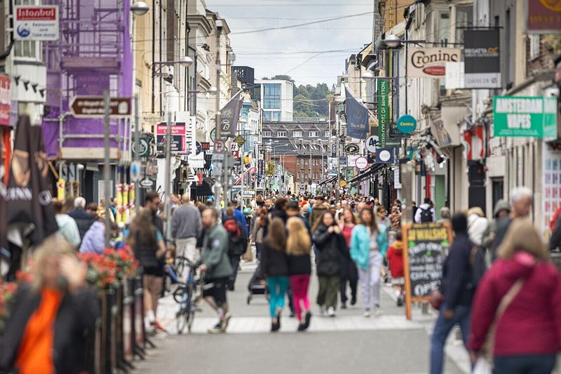 Shoppers walking down a busy Oliver Plunkett Street in Cork