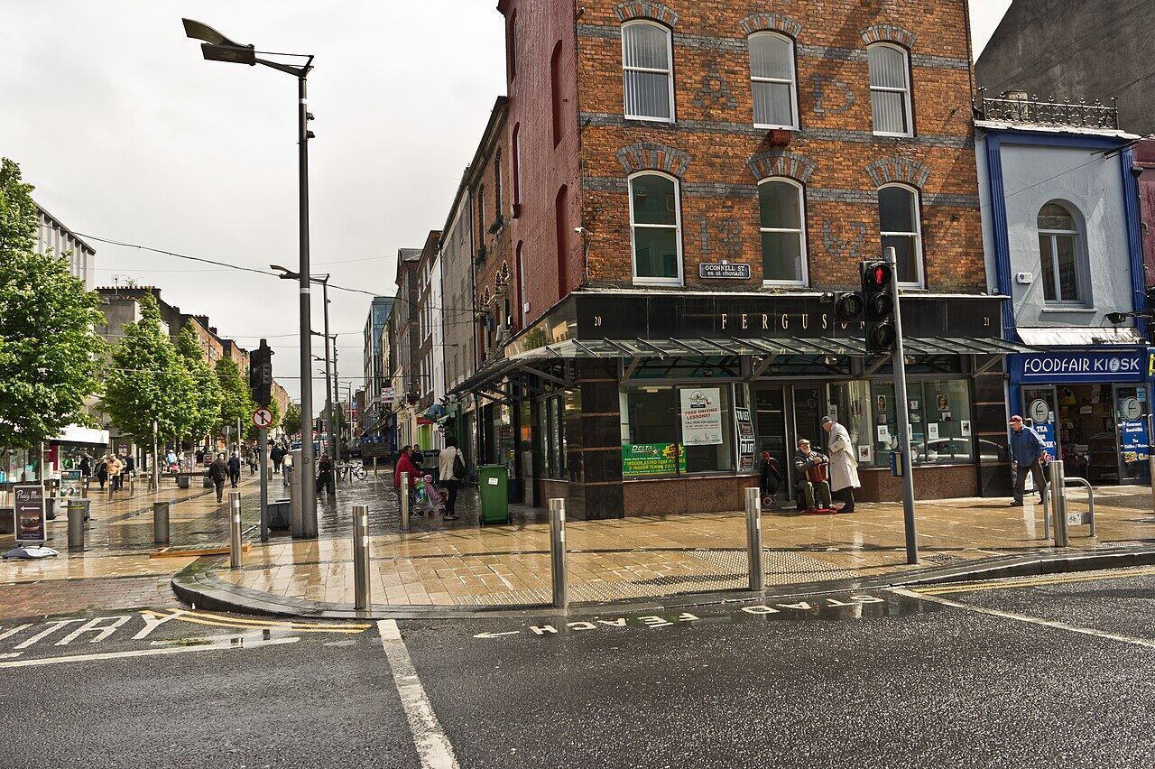 Red-brick buildings and a crossing on O'Connell Street, Limerick