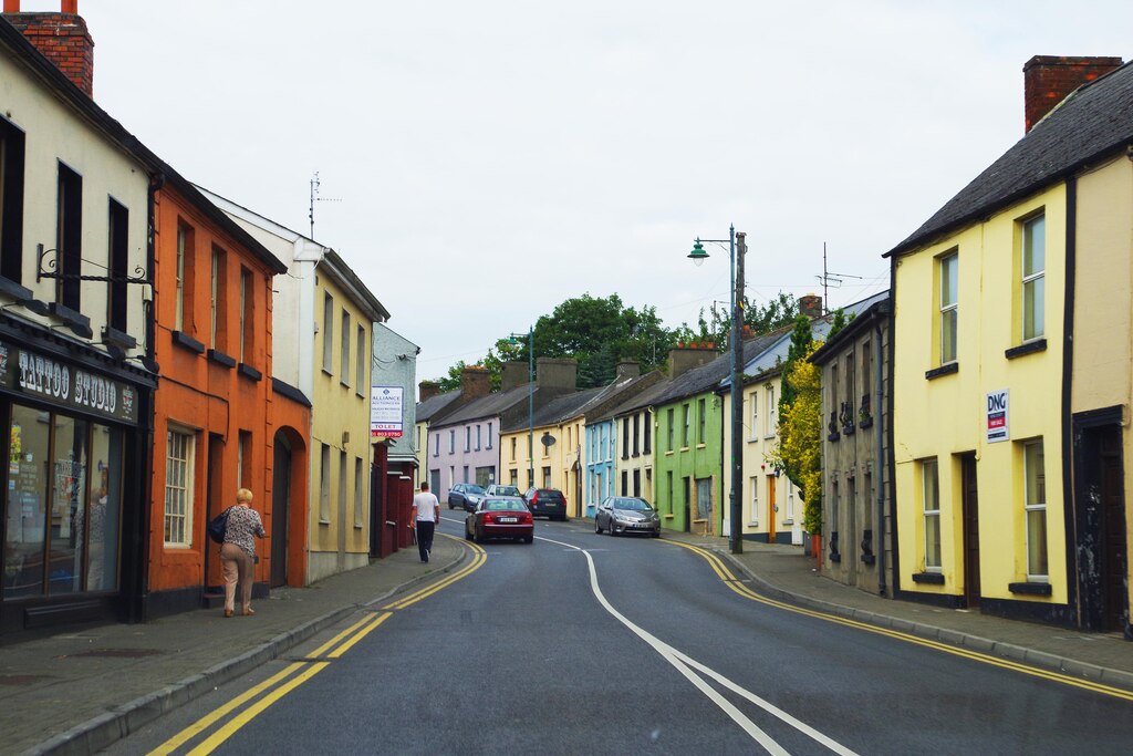 Carrick Street in Kells, a row of painted terraced shops and houses along a quiet road