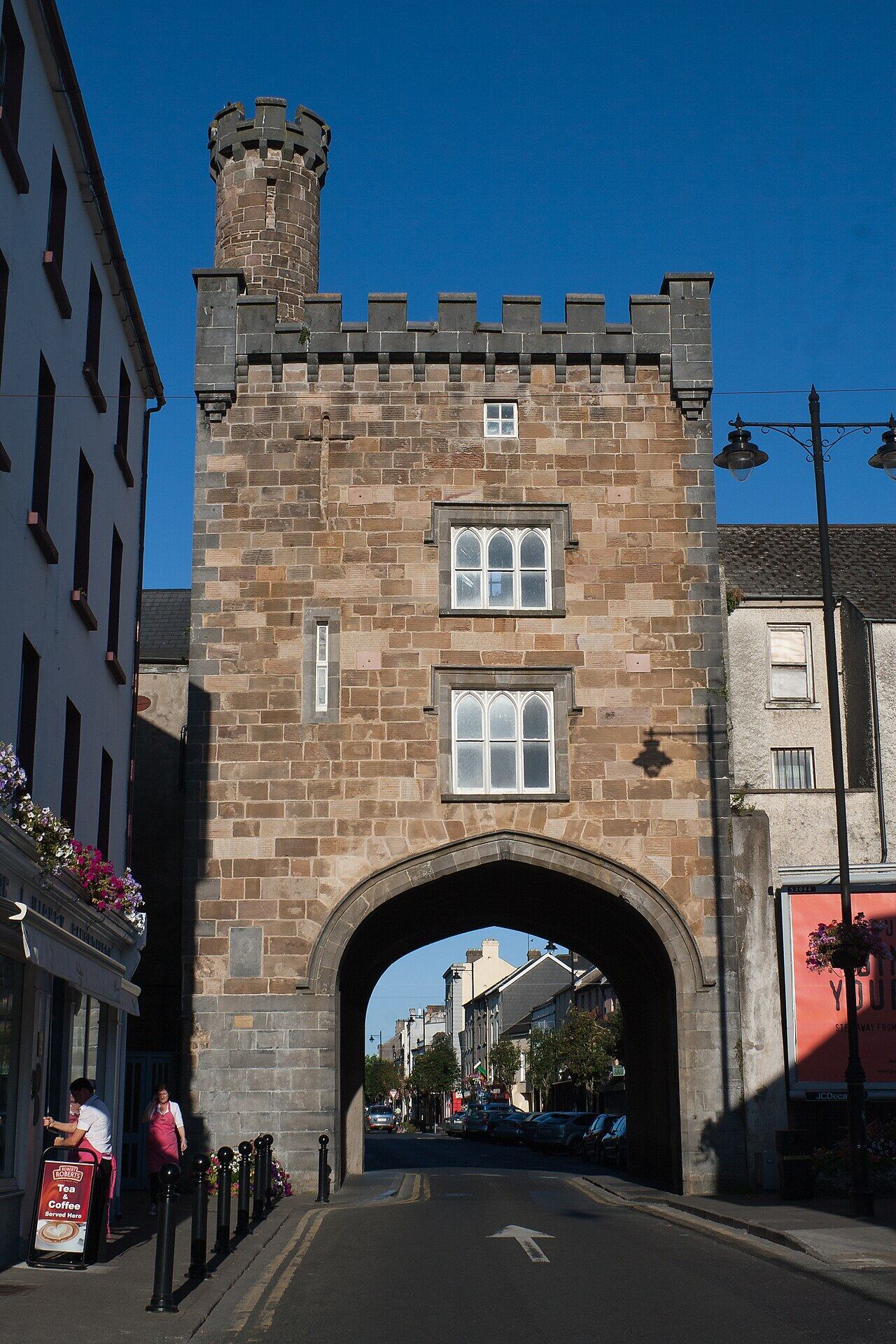 The stone West Gate arch over the street in Clonmel